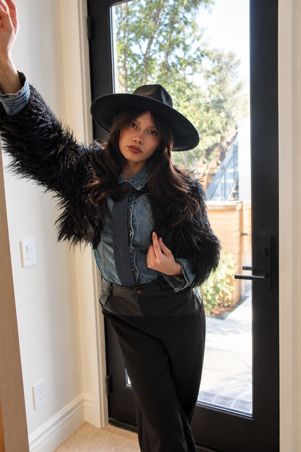 Boho Fashion Portrait in a Sunlit Doorway.png