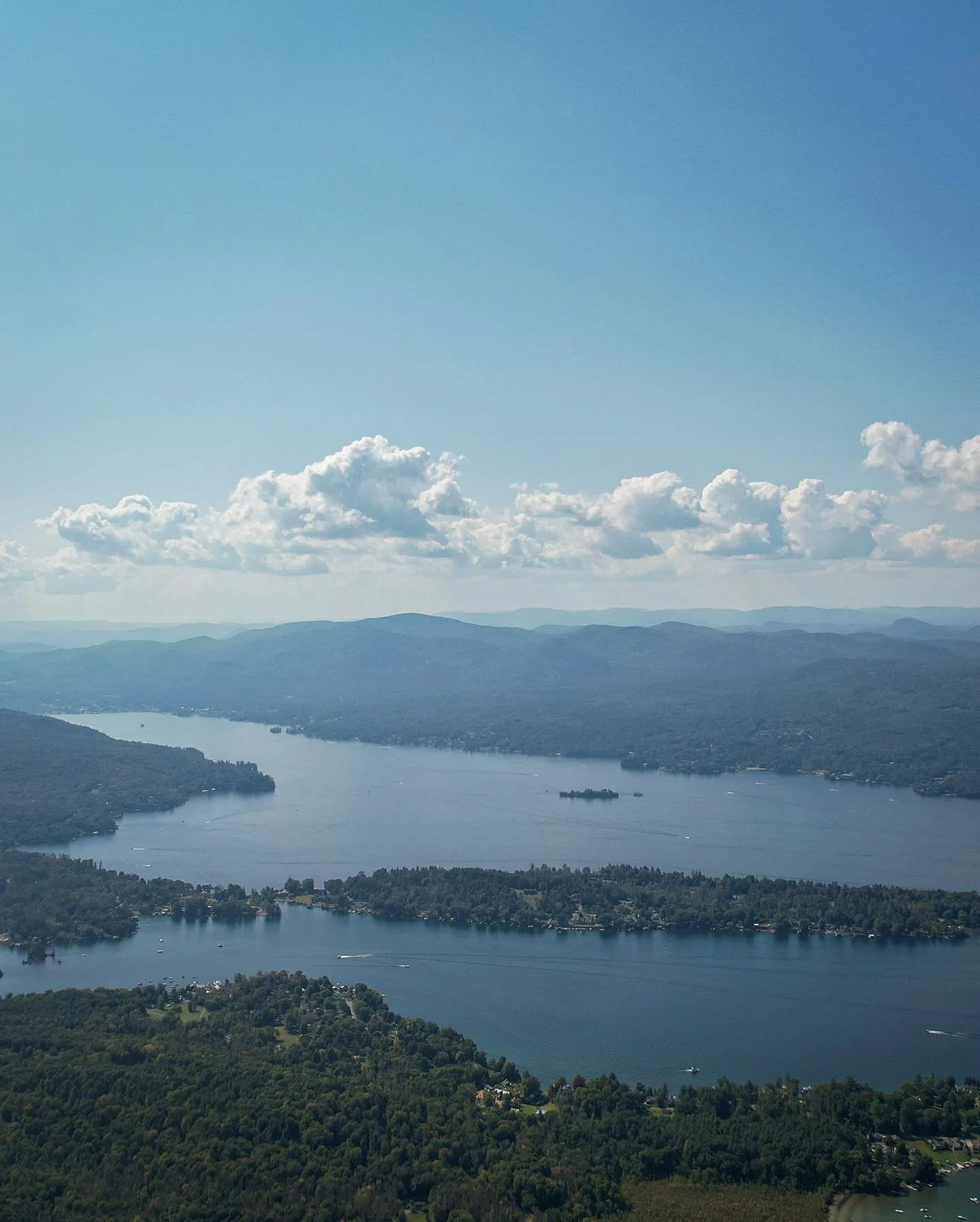 Above the Adirondacks, where the sky meets the water. 🌊✨ #lakegeorgeny from a whole new perspective. #dronephotography #boltonlanding #DJI #natureviews