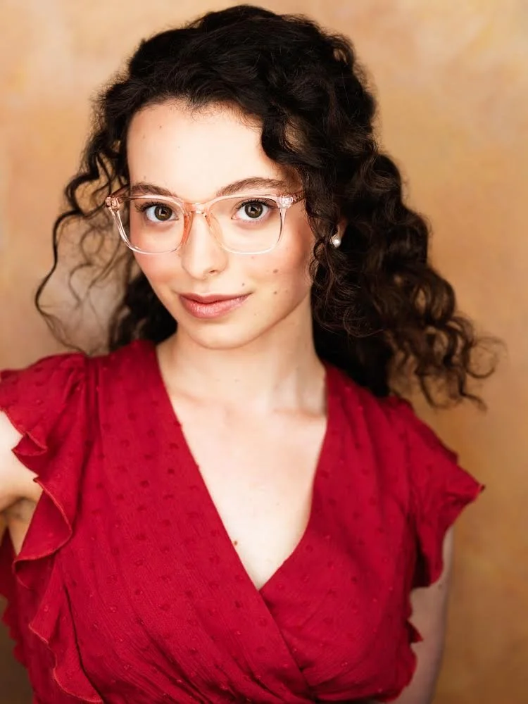 MarielaRivero_Headshot_Glasses.JPG