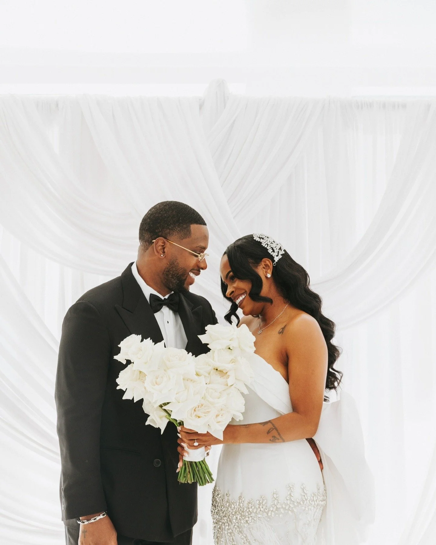 Brandi & Kedrick’s Wedding | 08.24.25 | Part I π€π€
The Barrow’s. 
#blissfulbarrow
.
.
.
.
Hair: @cuttheory101_hs 
Makeup: @beautyblvdbr 
Headpiece: @aiandeva 
Dress: @vlorakaltrina 
Shoes: @jimmychoo 
Event Coordination, Logo Design
