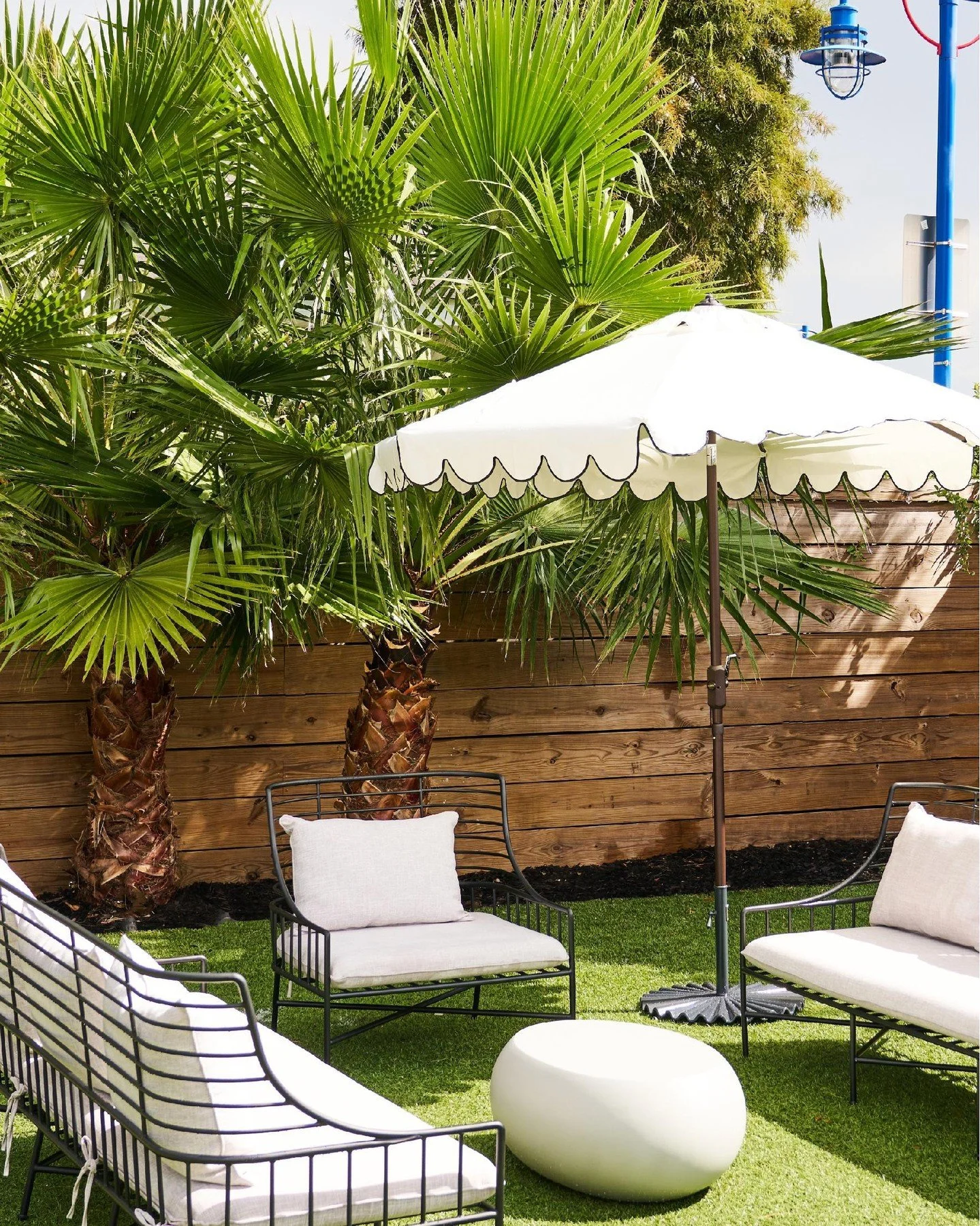 Our inviting outdoor lounge, perfect for intimate gatherings and relaxed conversations under the sun. π΄