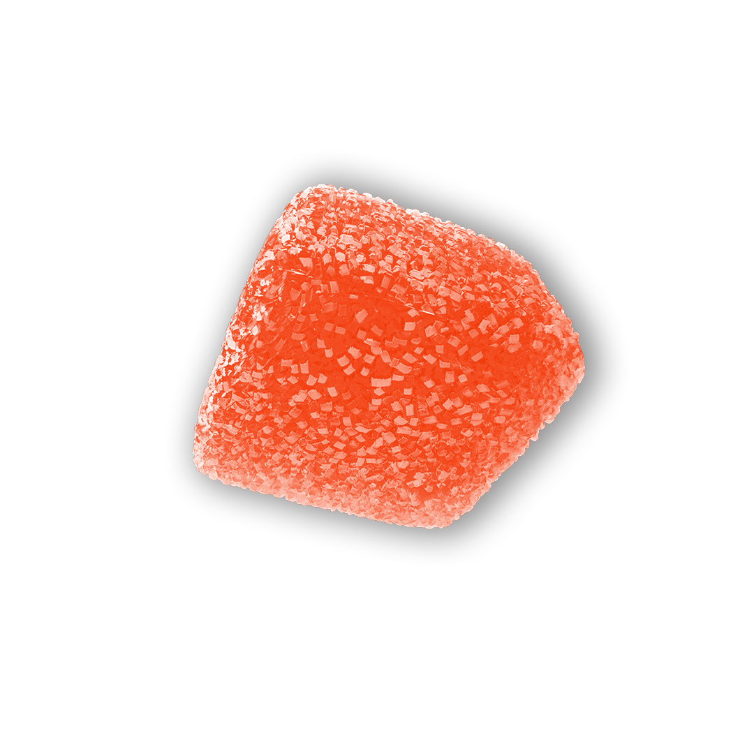 Close-up of an orange gumdrop with sugar crystals