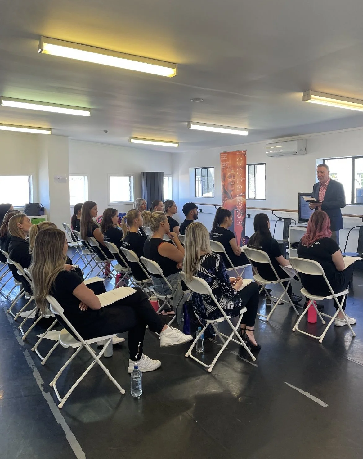 Me Terry speaking to an audience