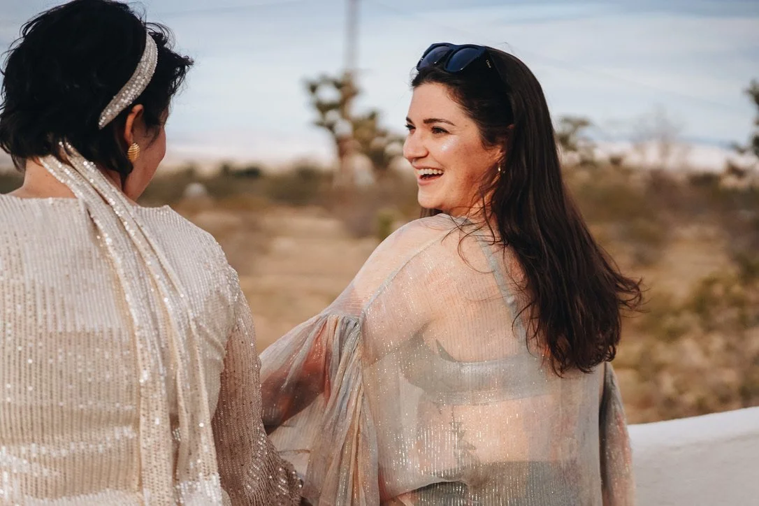 Testimonial: Woman who designed a year of her life and got clear on goals using the Play Big Playbook online course smiles at the camera