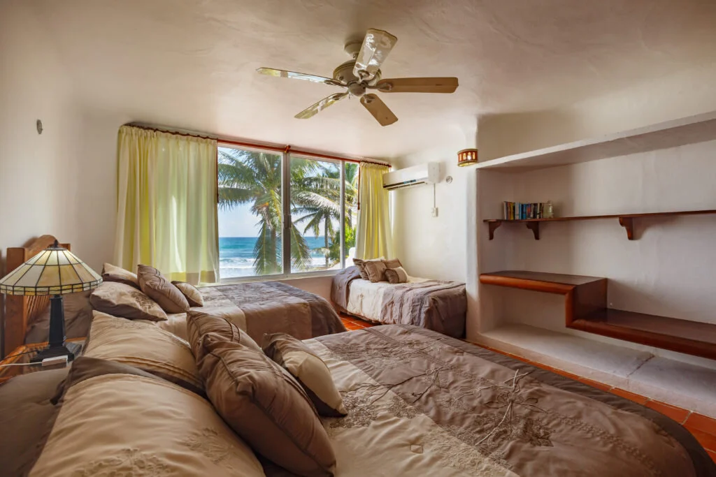 Villa_Balam_Ek_guest_bedroom_with_ocean_view.jpg