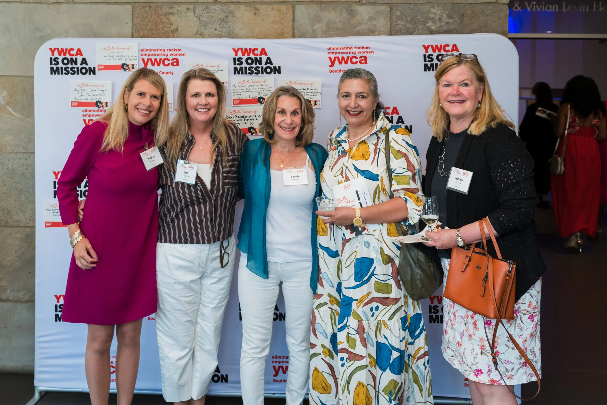 Debbie Pope and Women in Front of Step and Repeat.jpg