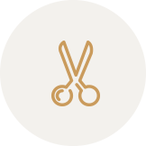 Icon of scissors on a circular background