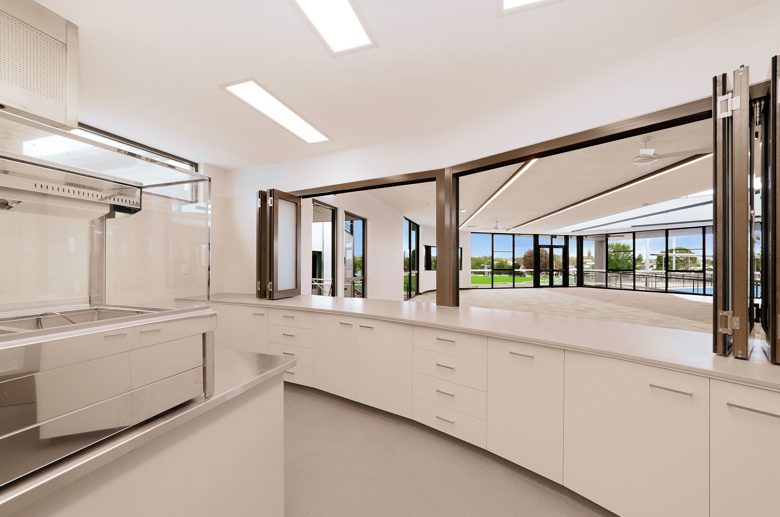 Melville Oval community pavilion kitchen opening to the social room