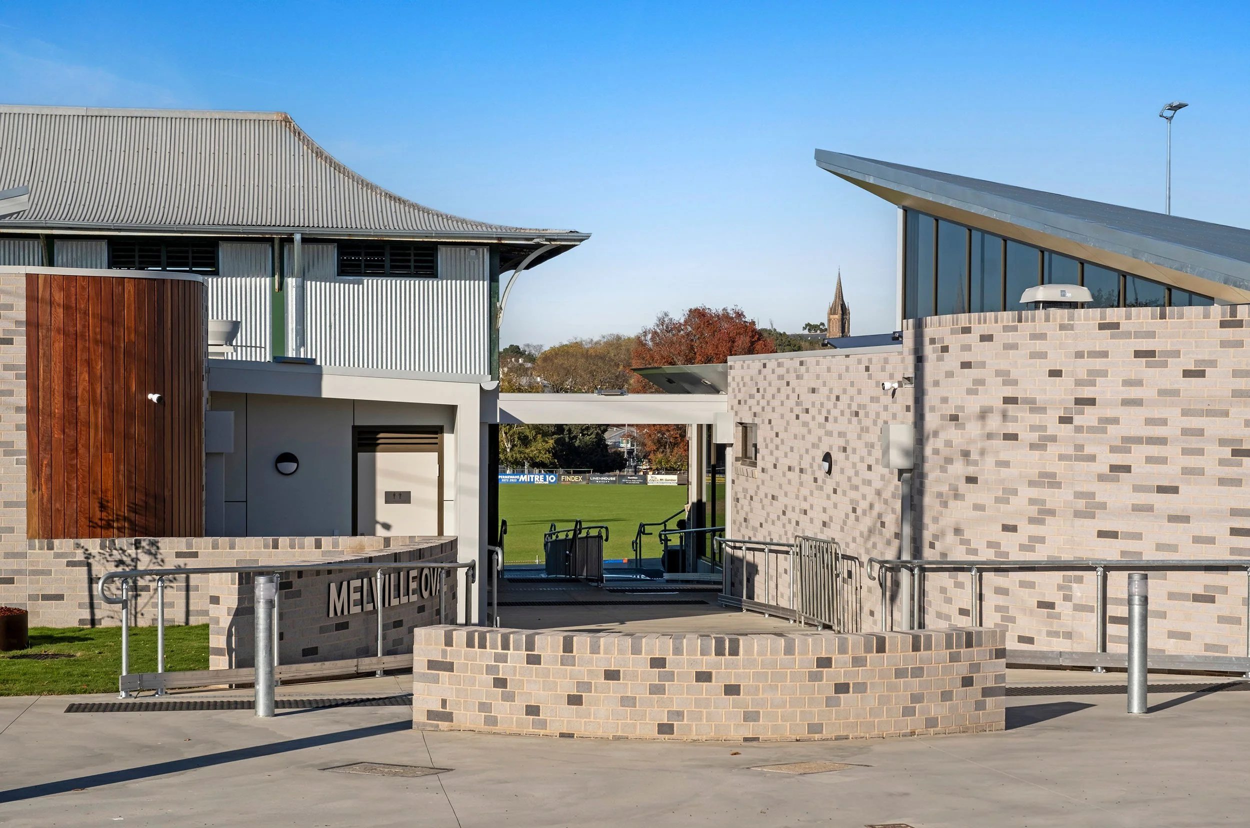 Melvile Oval heritage grandstand next to new pavilion