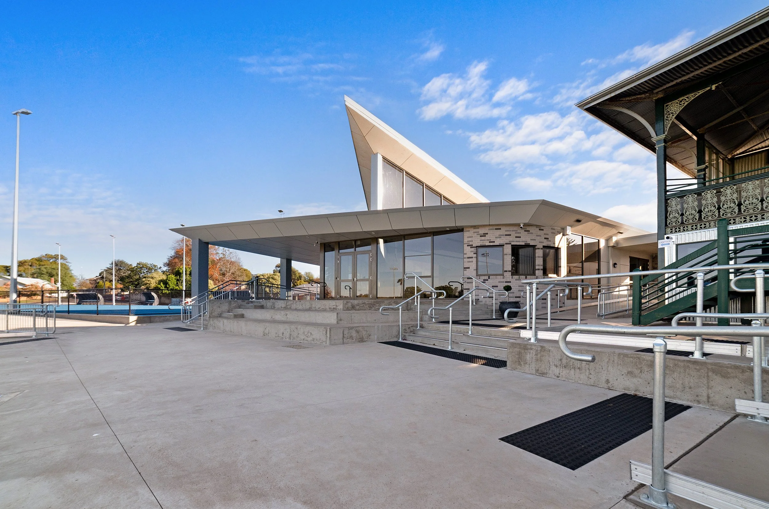 Melville Oval Sports Pavilion, striking geometric angles with large windows overlooking the sports field