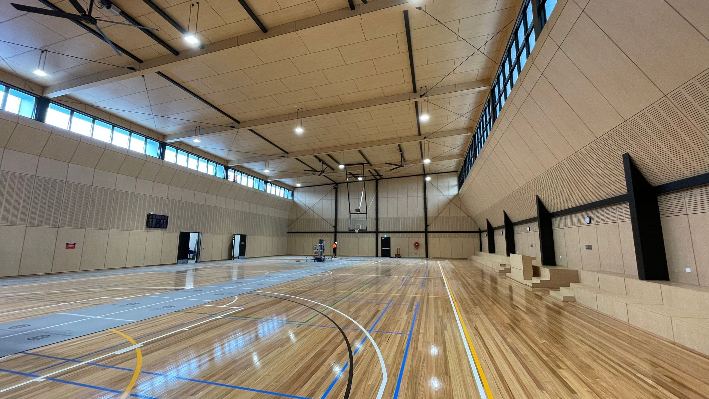 Jamieson Way Community Sports Hall multi sport court interior with plywood walls and timber flooring