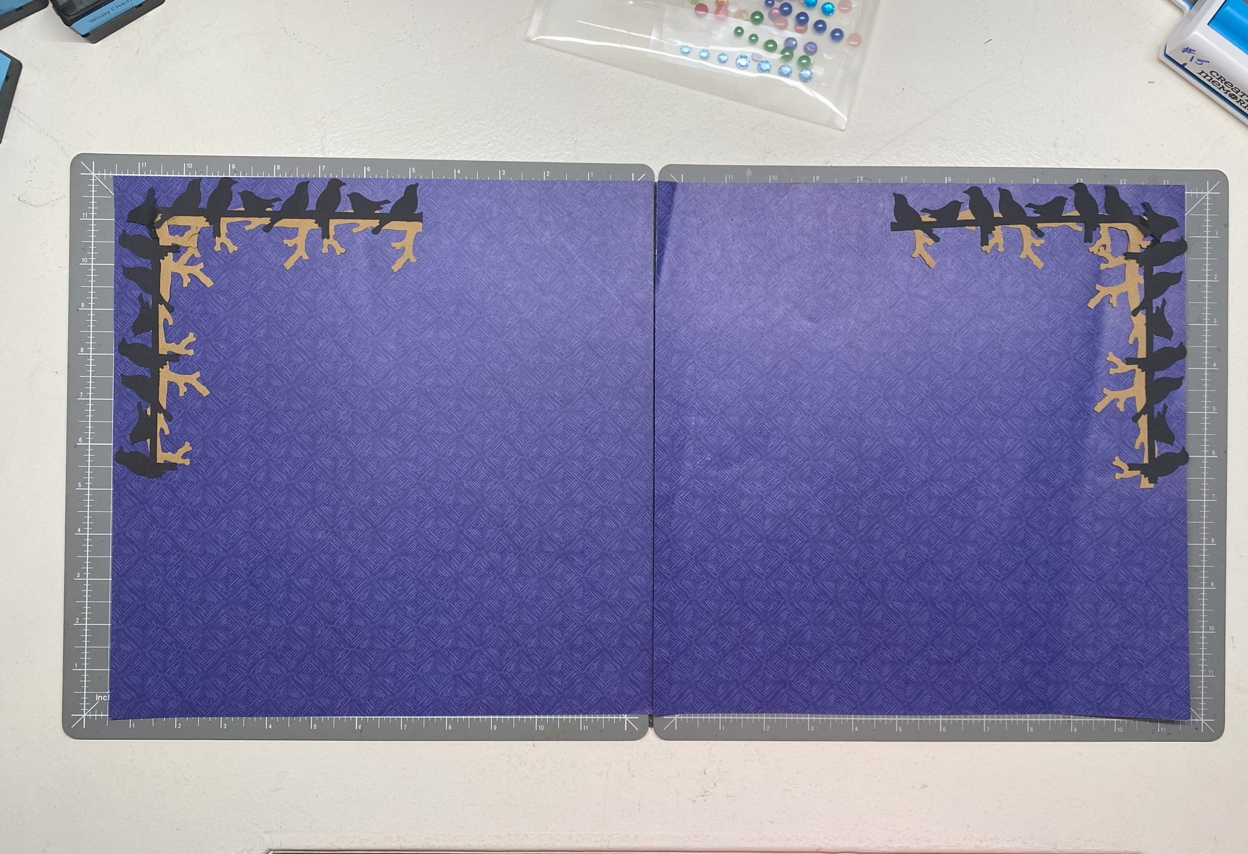 Blackbirds and branches, double-page spread.jpeg