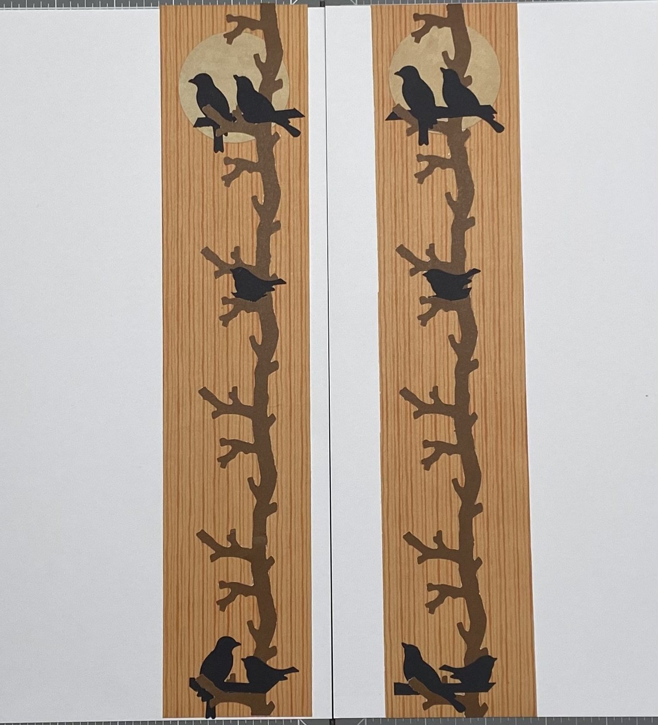 Vertical Blackbirds on Branch.jpeg