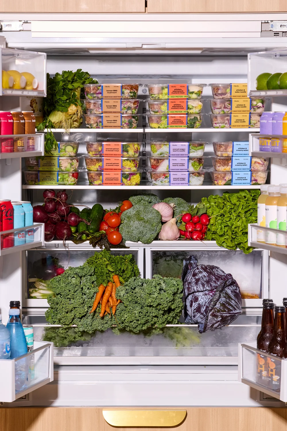 Cheeky bowls and fresh vegetables in the fridge