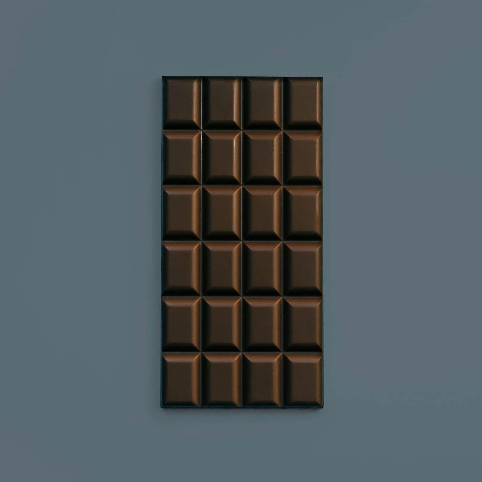 Tafel Schokolade auf einem grauen Hintergrund