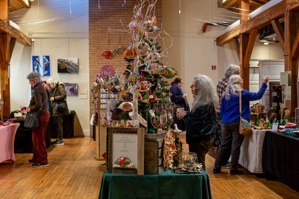 Visitors browsing handmade art and crafts at Sandy Spring Museum’s Holiday Gift Show.