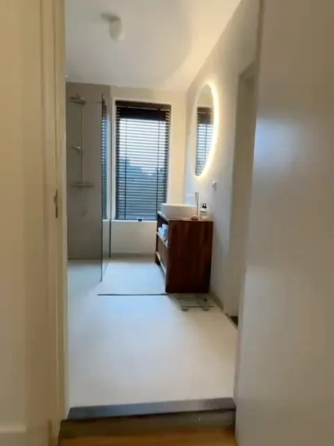 We completely transformed this dated bathroom into a chic, robust , hotel-style retreat&mdash; bold materials, warm tones, and a timeless design. ✨

Every detail counts. From the tiles to the lighting &mdash; all custom made for that hotel feeling at