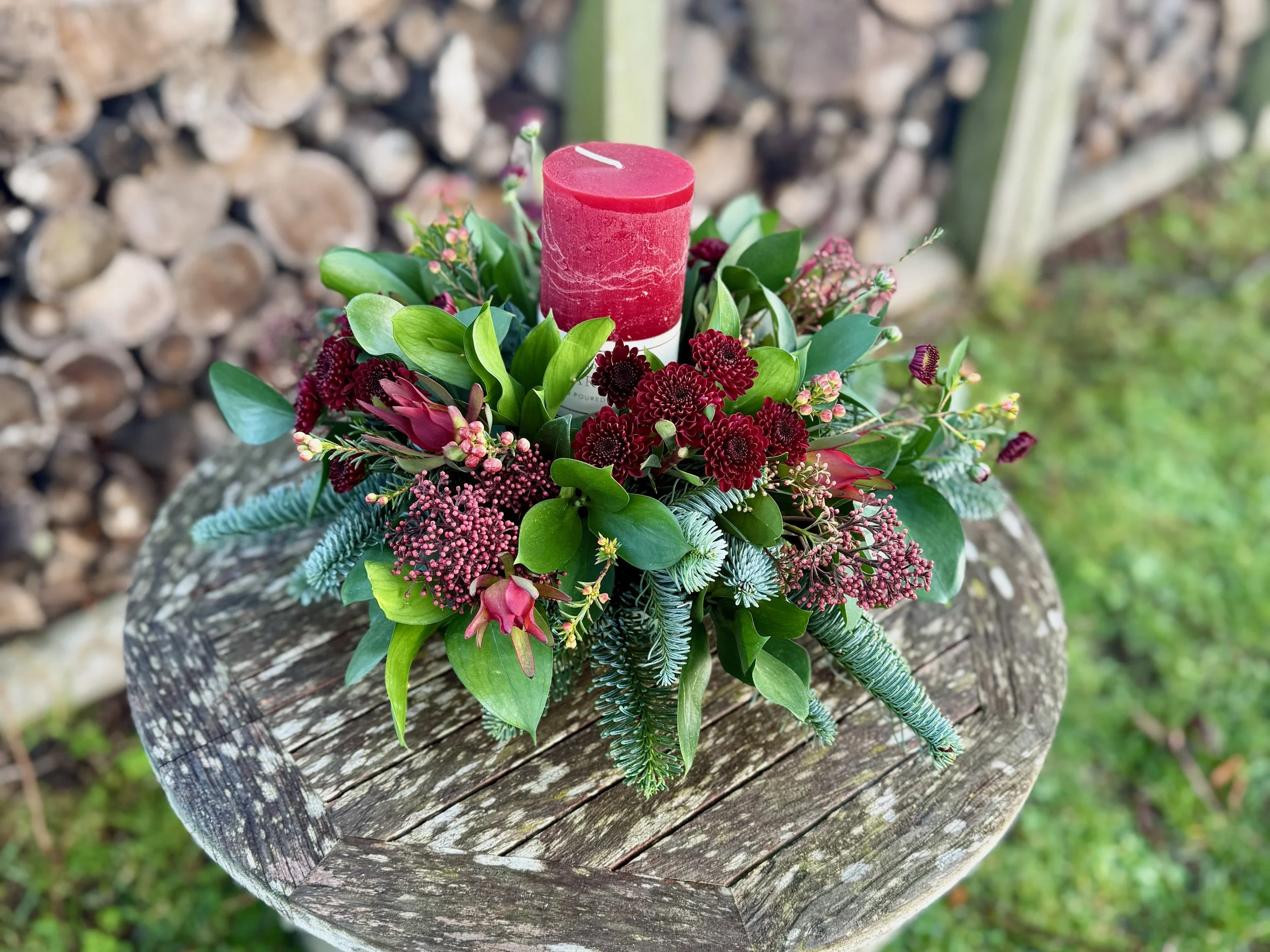 Christmas table centrepiece arrangement - reds
