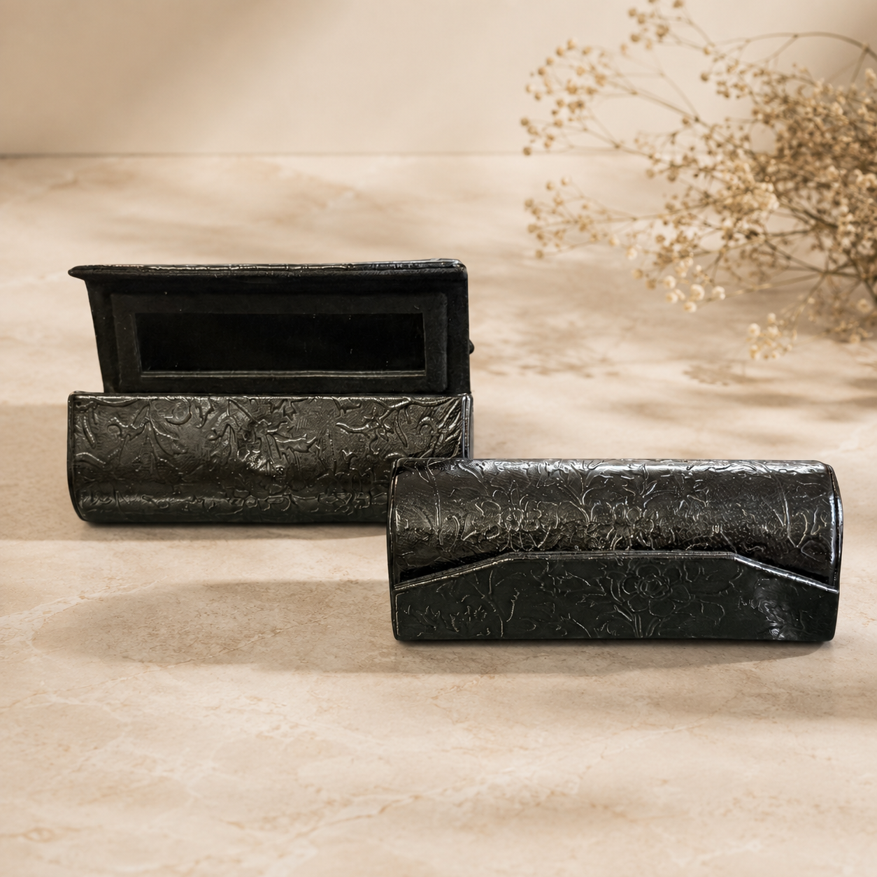 Embossed Leather Cases on Marble.png