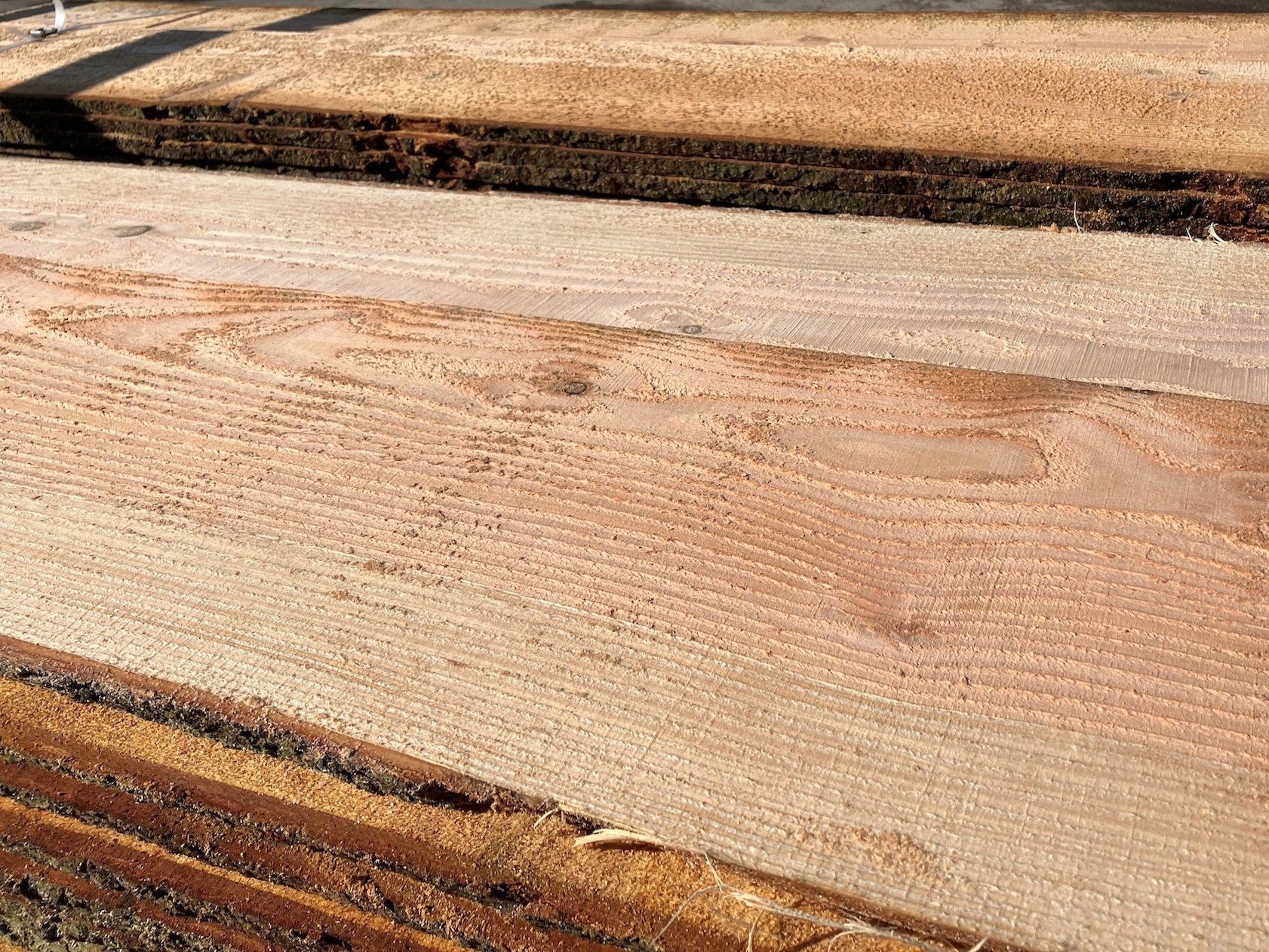 Close-up view of wooden planks with visible wood grain and texture.