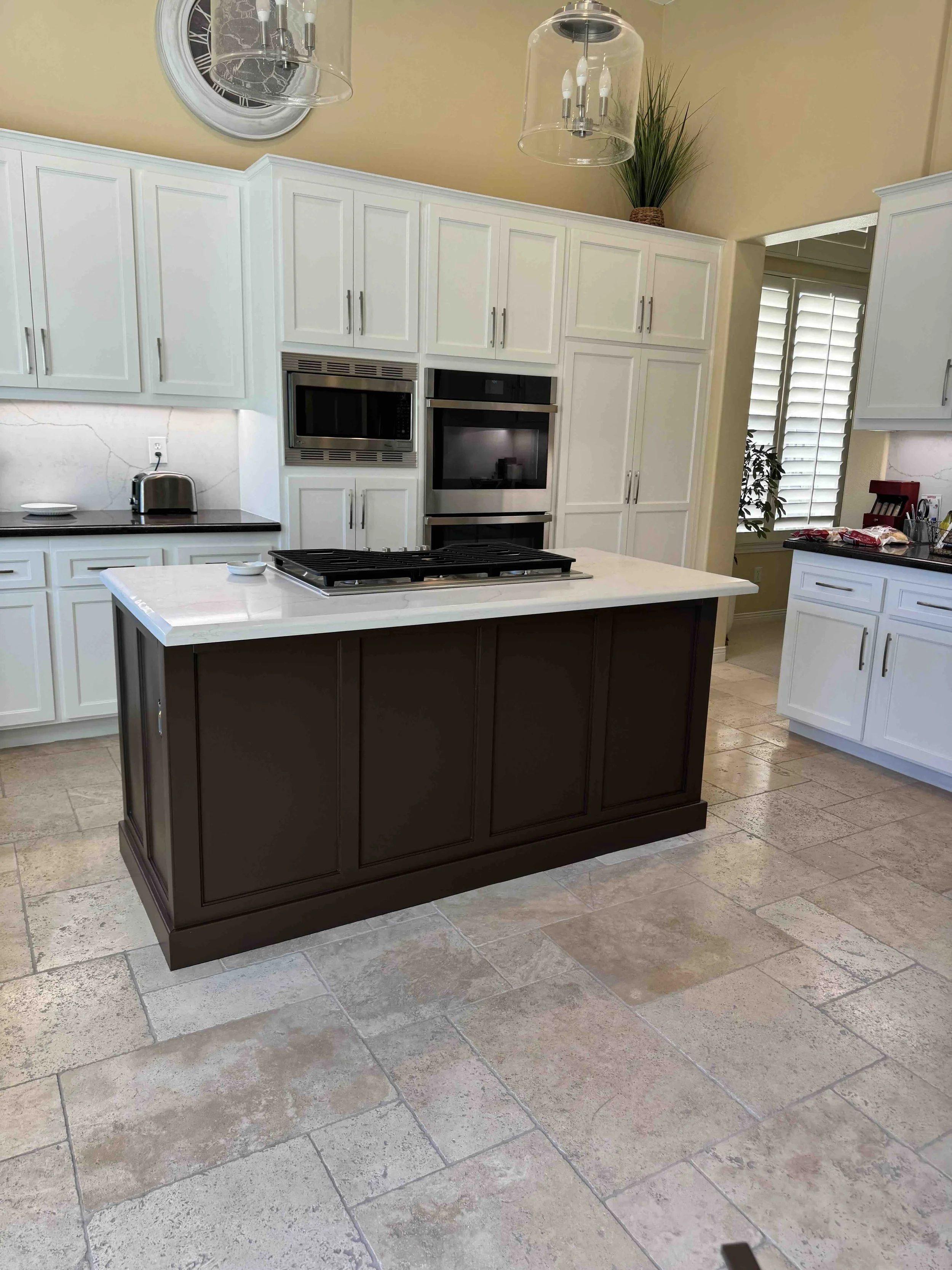 This Thousand Oaks kitchen island required a remodel to build it out in Shaker Style to match the cabinetry in the kitchen.  