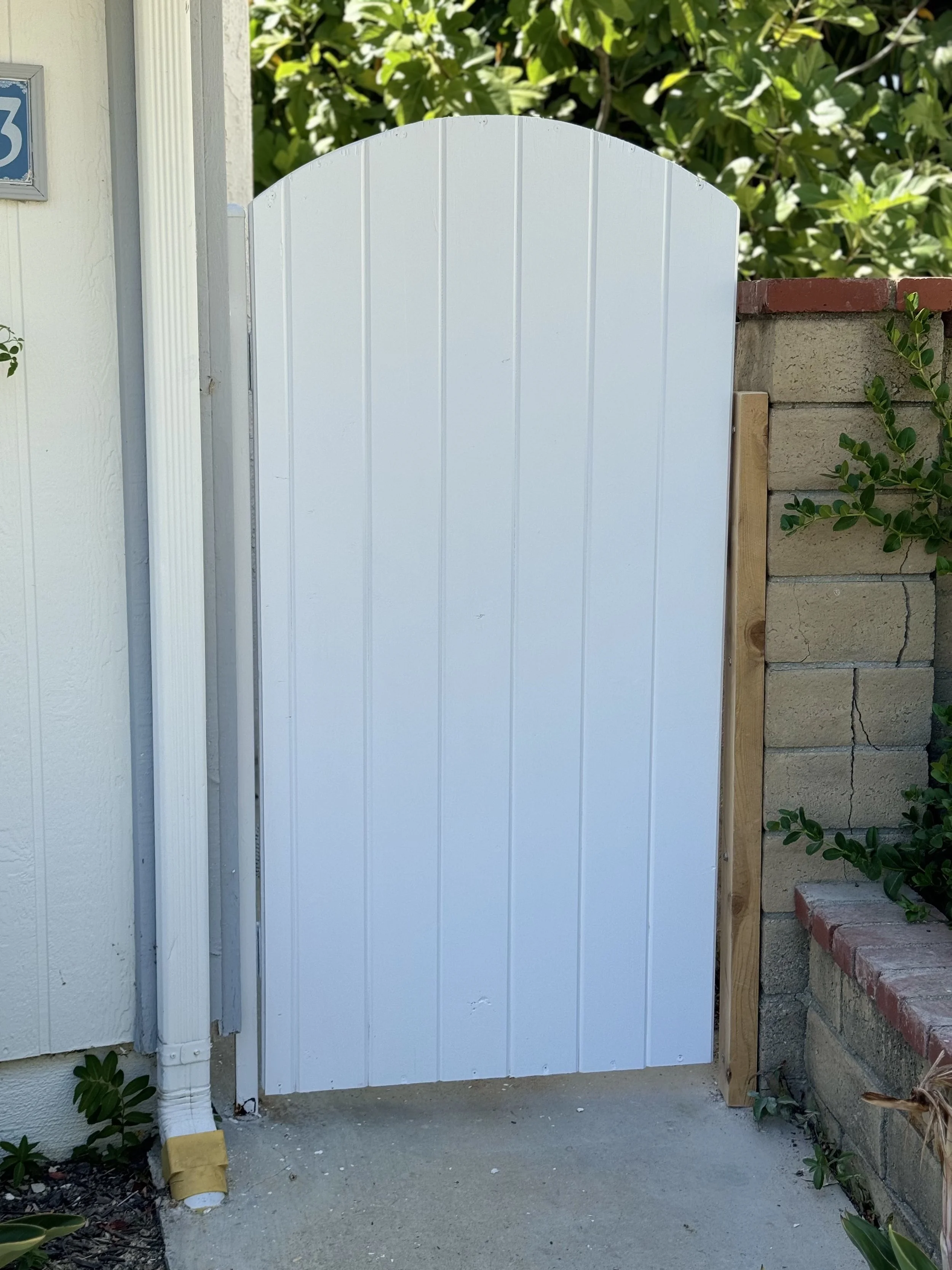 New poplar wood gate designed and built by Thousand Oaks Handyman
