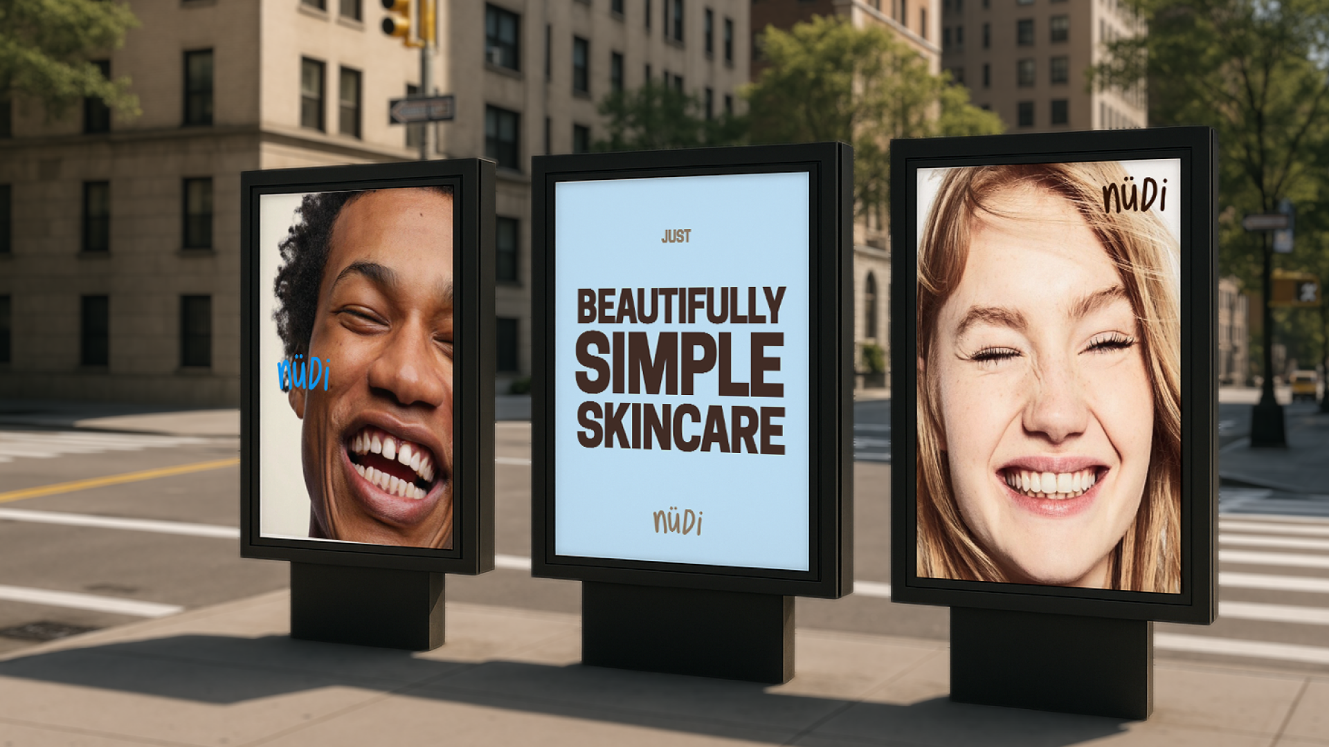 Advertising display with photos of smiling people and text promoting simple skincare by nüdi in an urban street setting.