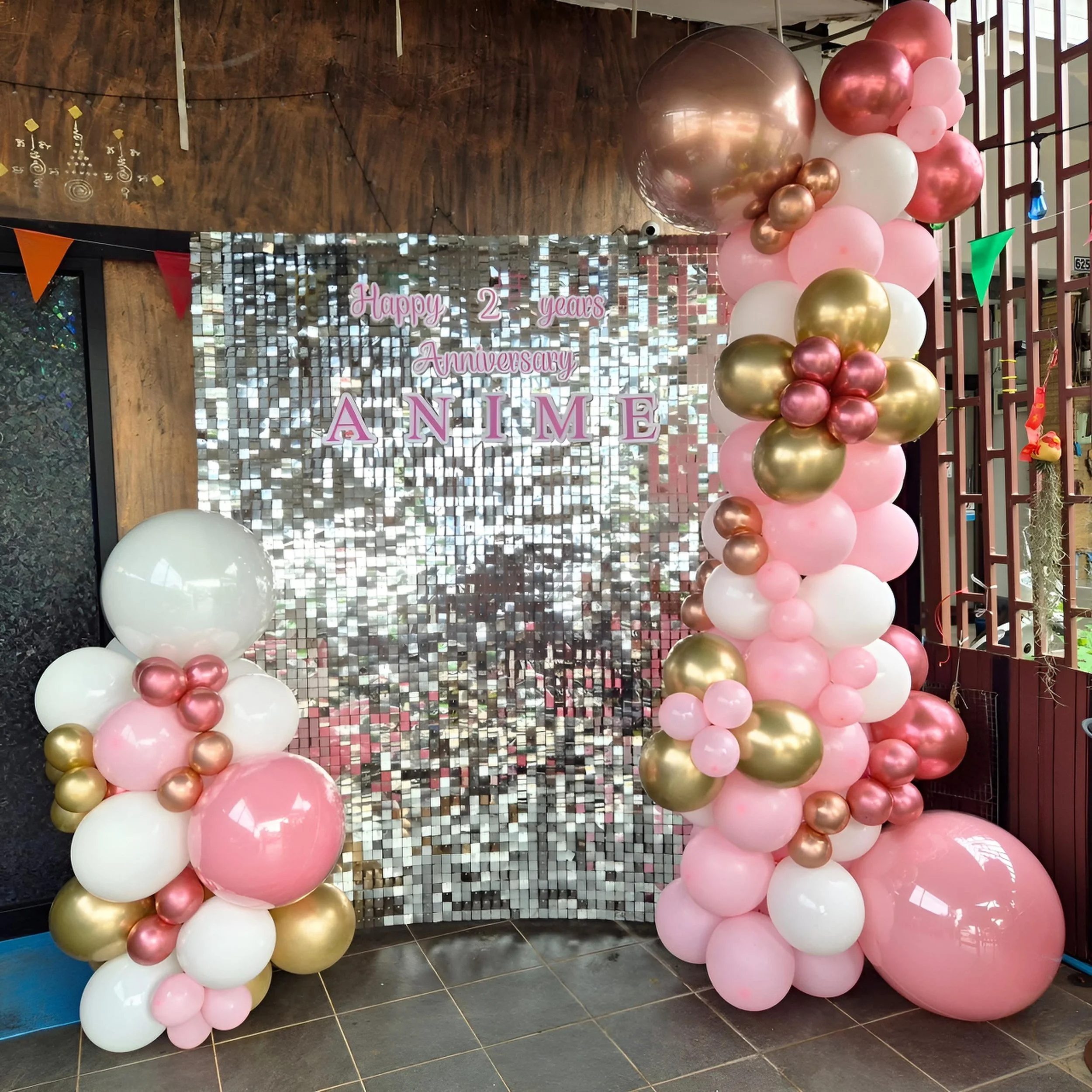 Glittering backdrop with balloons for a party
