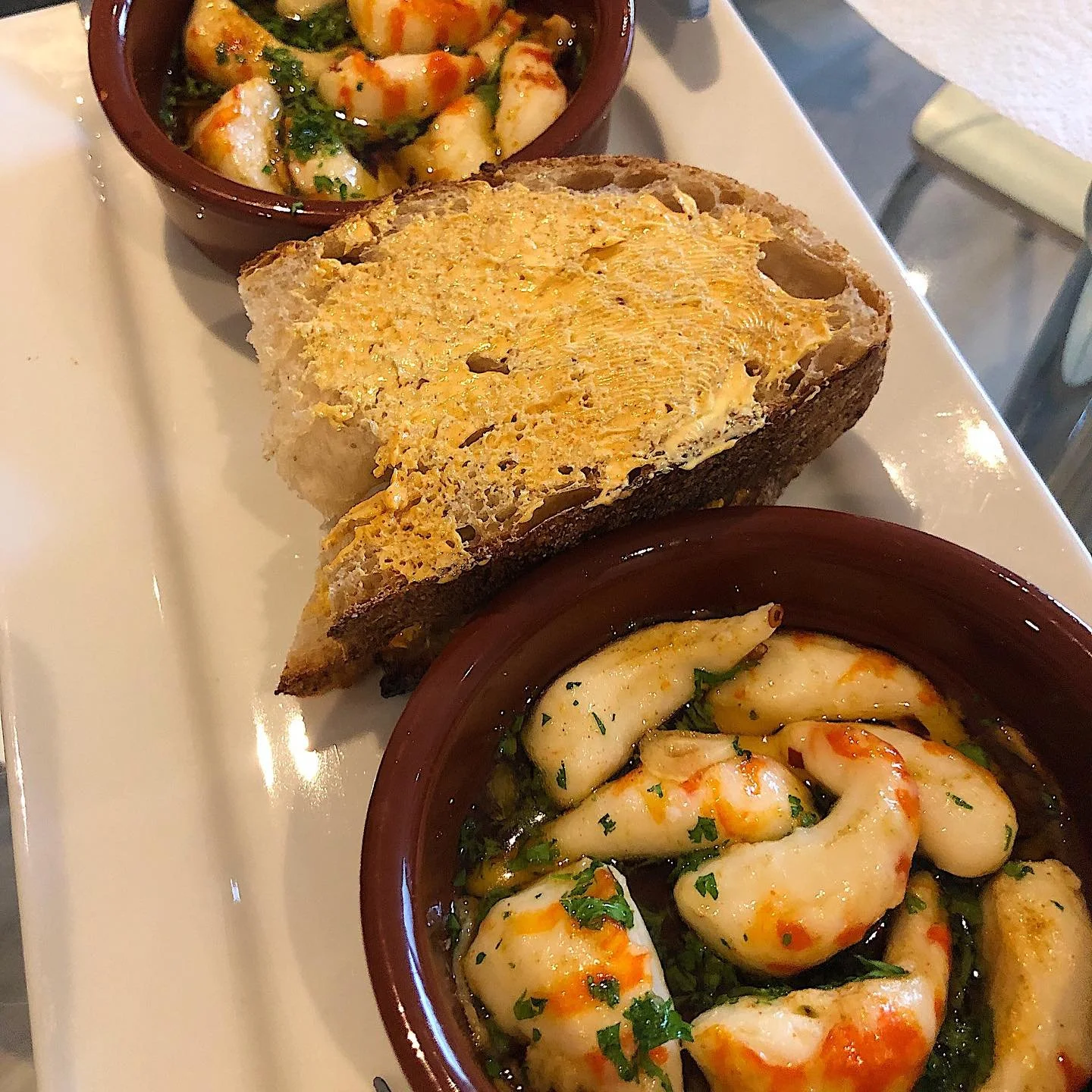 Vegan gambas pil pil with sourdough bread followed by a vegan Costco chicken and bacon pizza roll topped with ranch sauce and an edamame salad 🥗
The pizza roll was massive and I would gladly have it everyday.