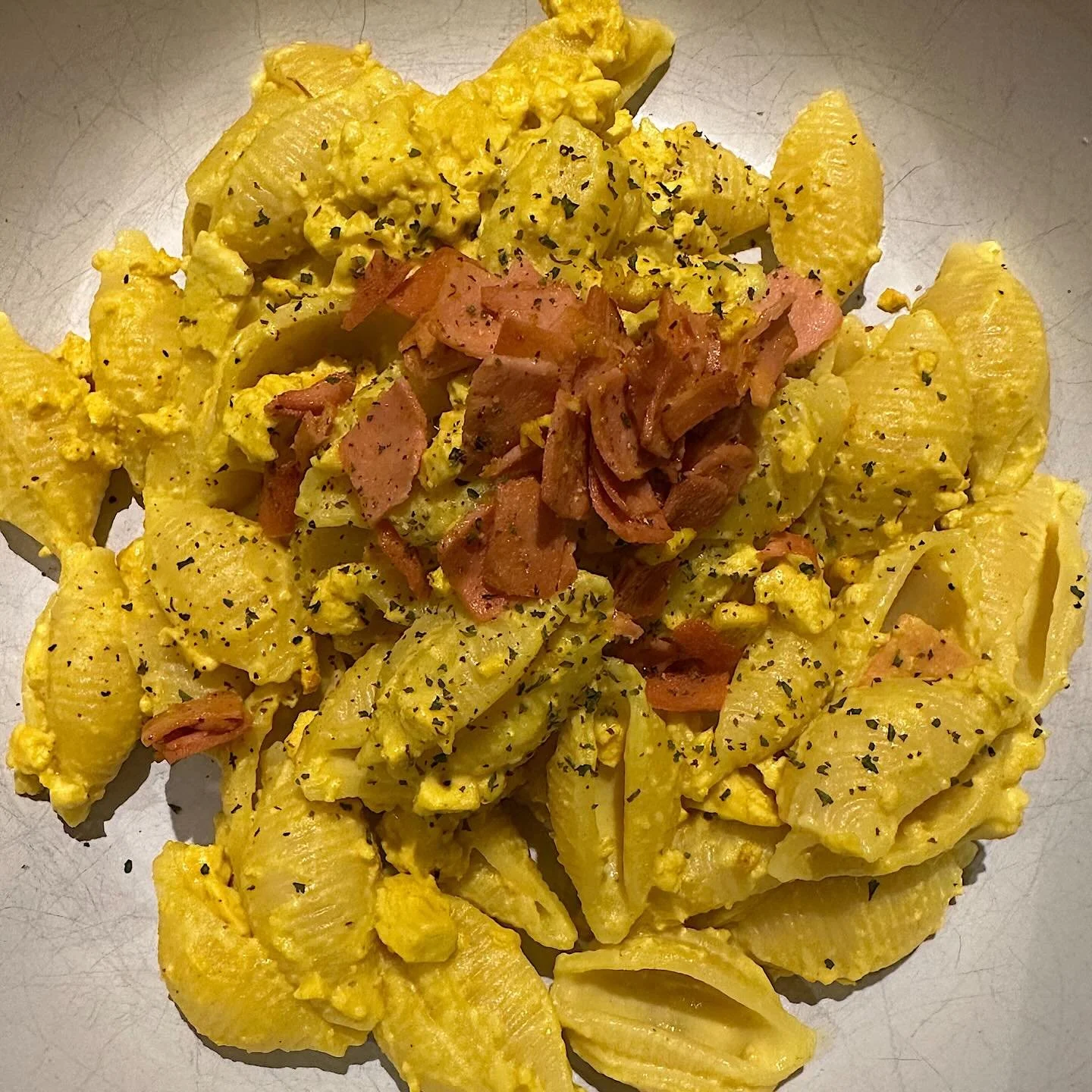 Cashew carbonara with scrambled @tofoo , fried @quorn_uk ham and little shell pasta.

Made this on a whim because we had vegan ham to use. Took some for lunch the next two days. Class would make again.