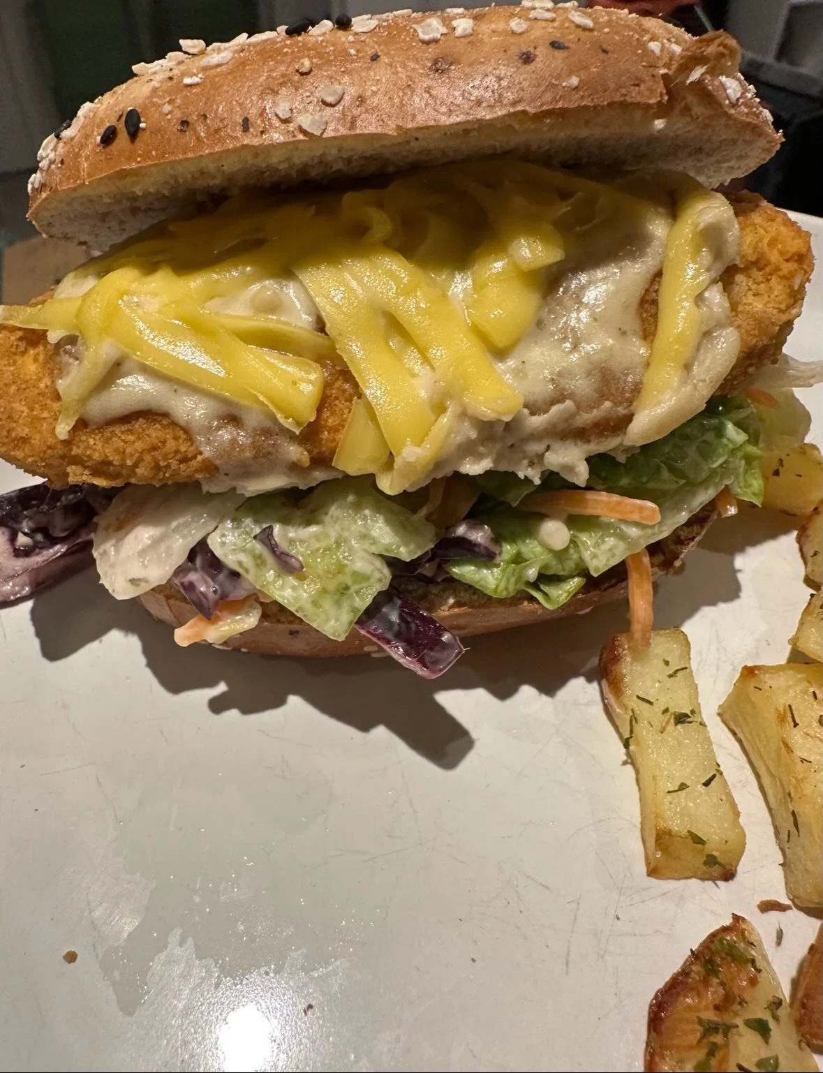 Homemade @dotbagels because Newcastle is so far away from Manchester. Vegan north east Parmo with @quorn_uk buffalo chicken fillets, cashew b&eacute;chamel, @violife_foods cheese and a homemade garlic slaw on an everything bagel. And one NFC with hom