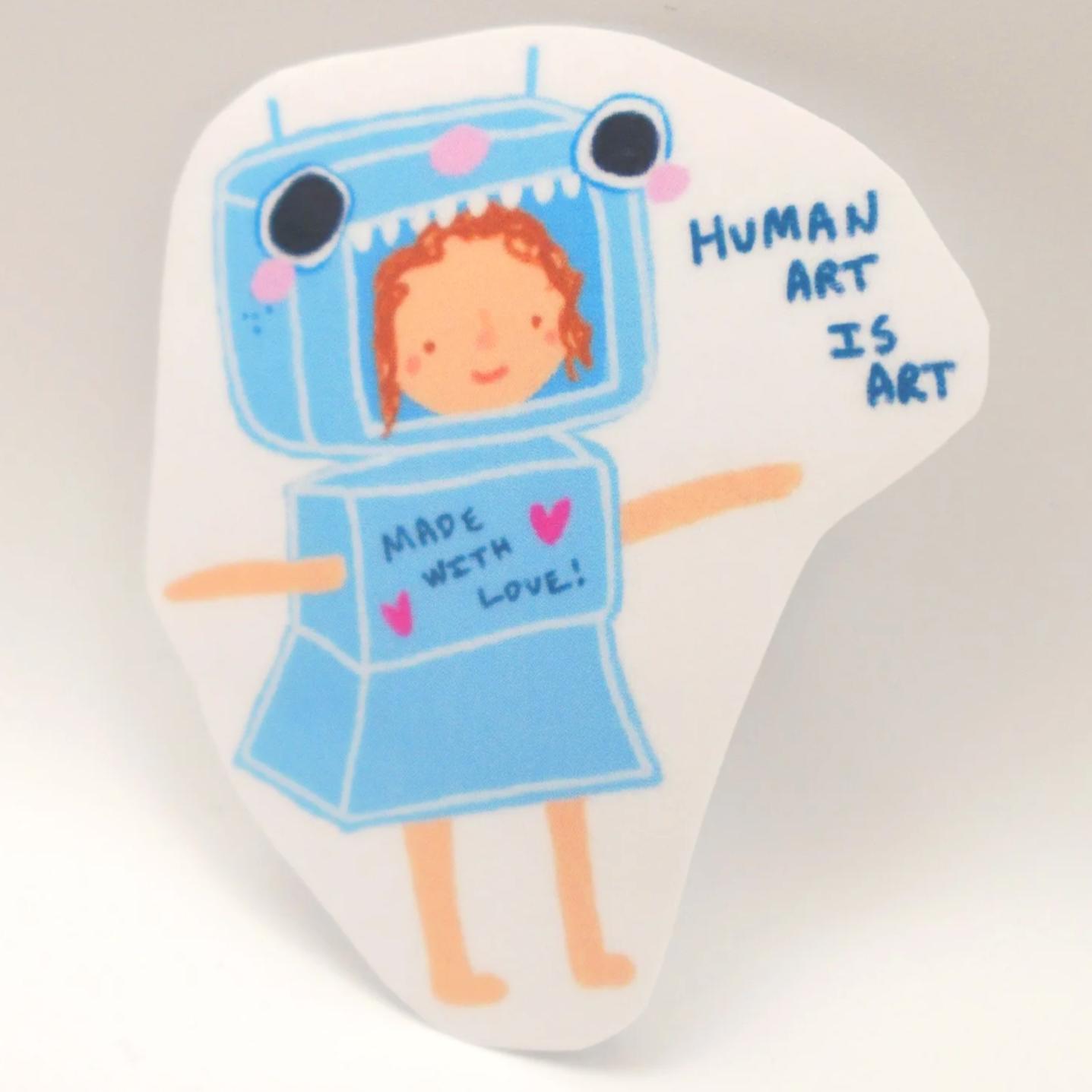 Girl that's also a robot with the text "human art is art"
