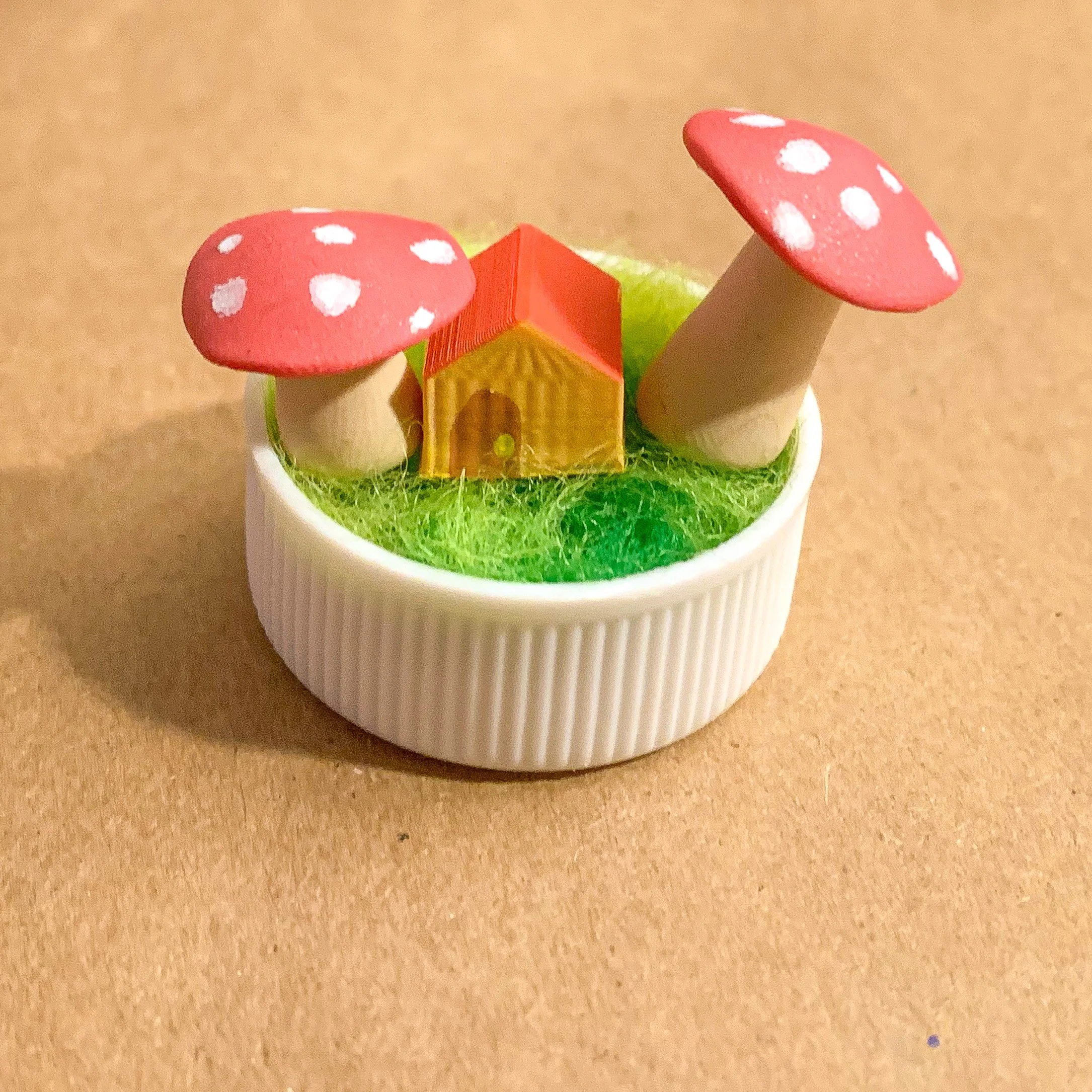 Bottlecap Terarrium with clay mushrooms and a 3D printed house