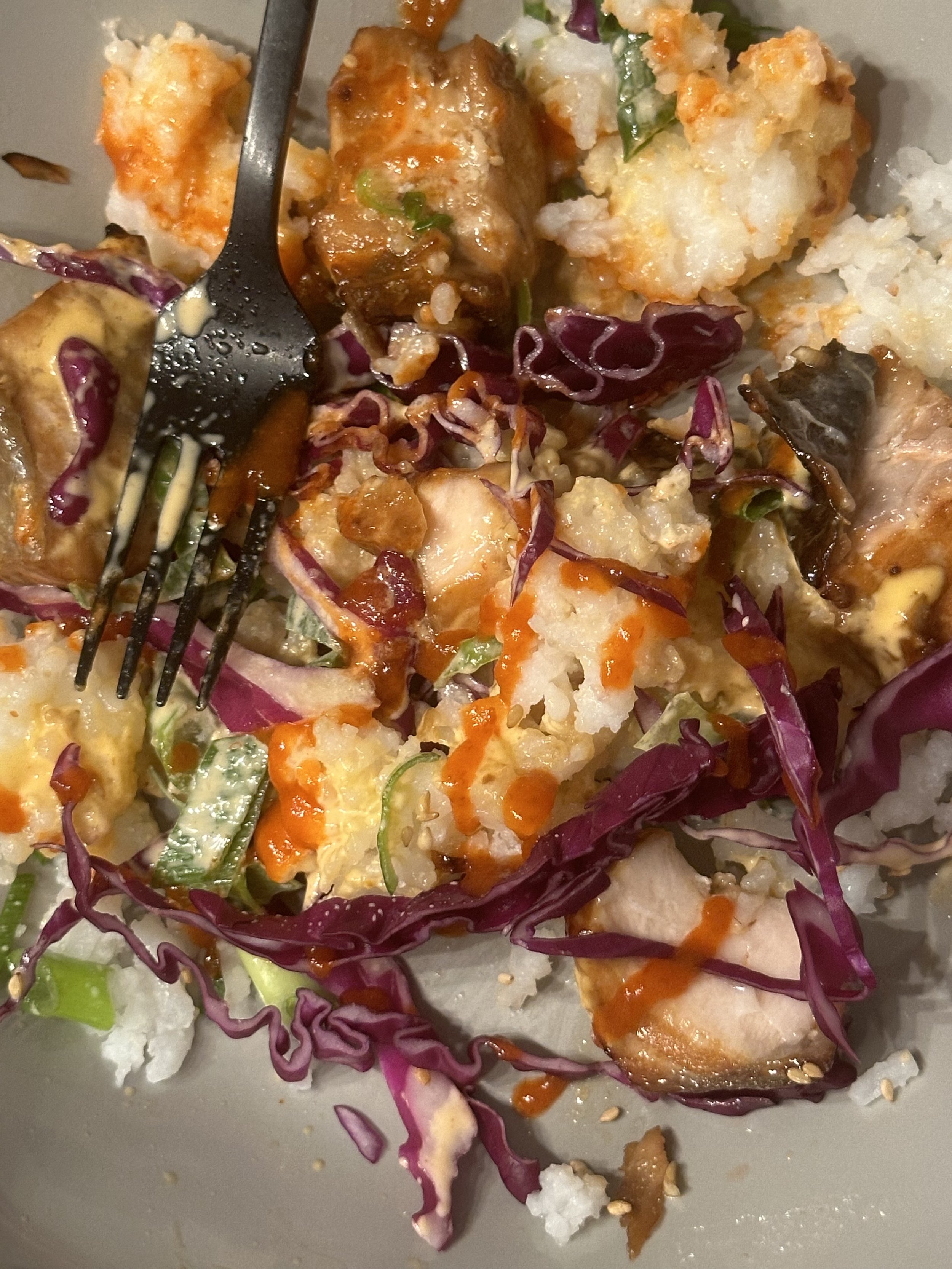 chili garlic salmon plated with fork.jpg