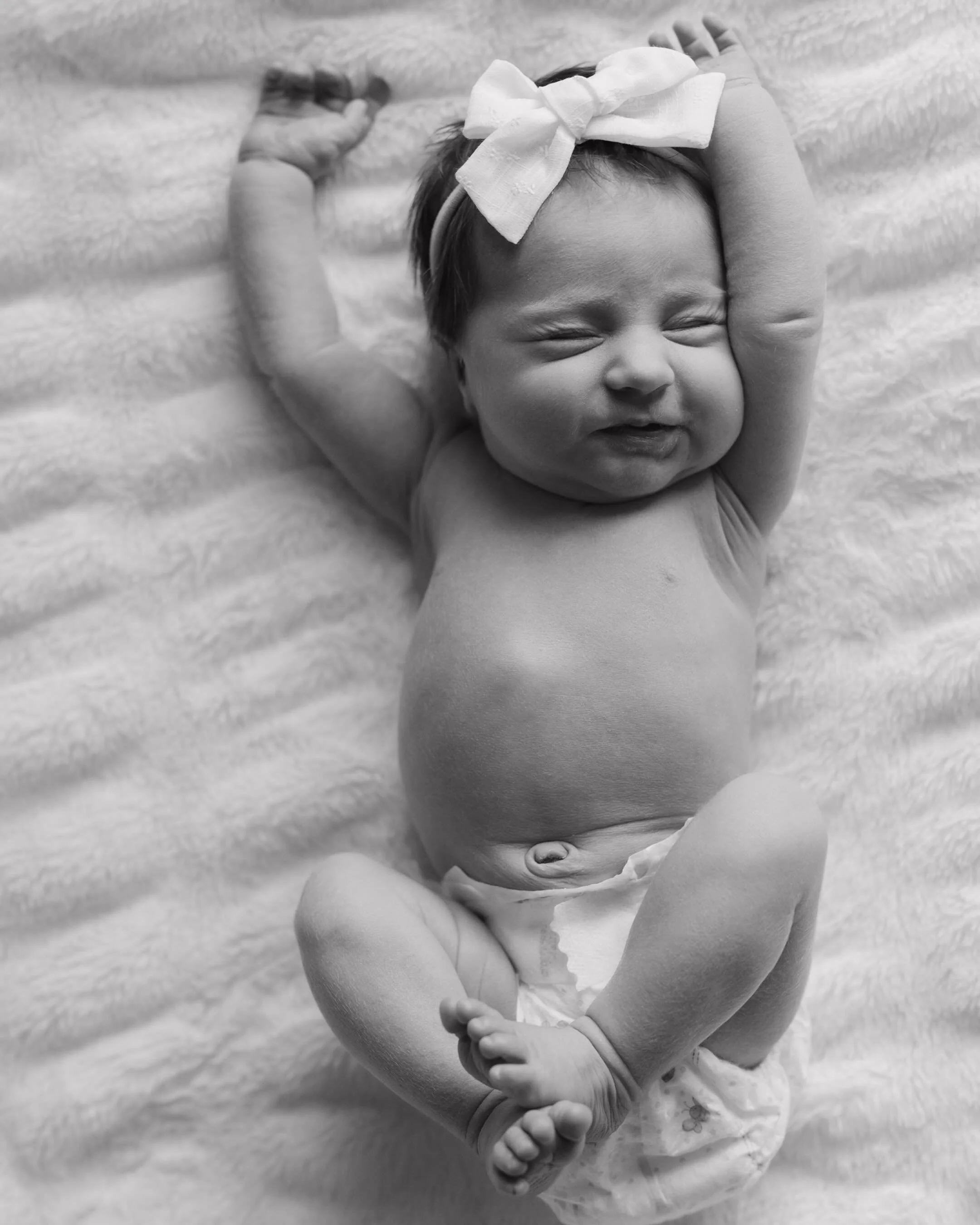 Baby Mila was nothing but smiles at newborn photos 🤩
