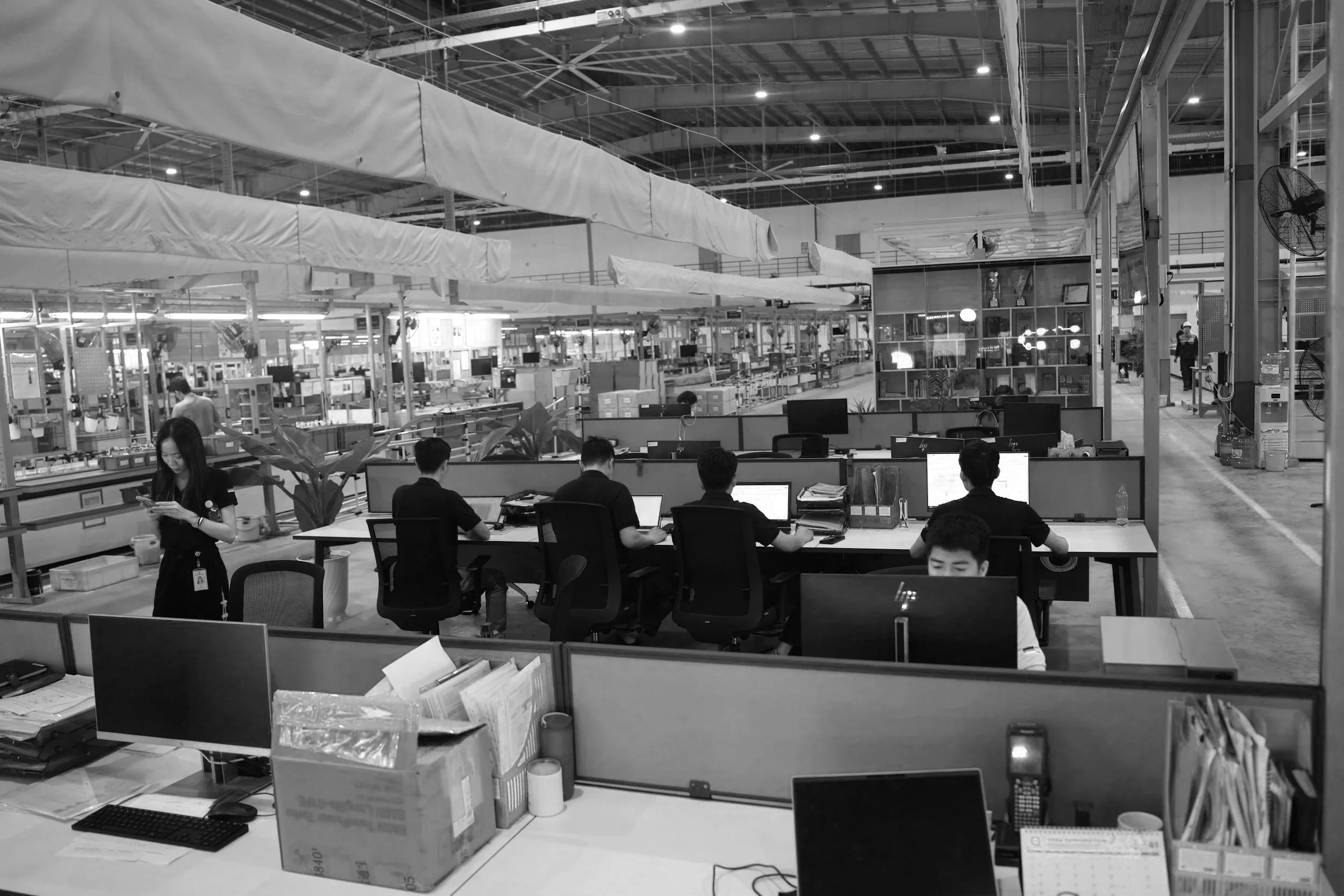 Employees working in a large office space