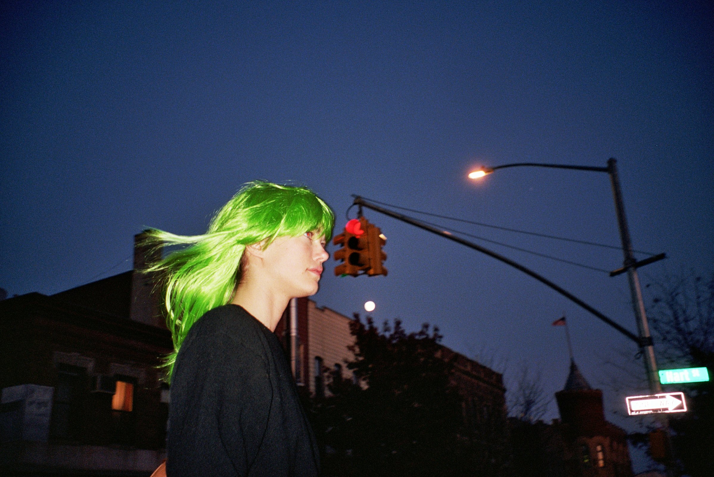 Mathilde Brok Brandi walking with the dark background for the photography story in office magazine New York