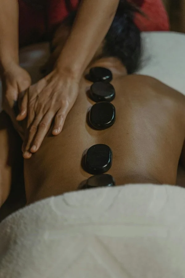 Hot Stones Massage on client