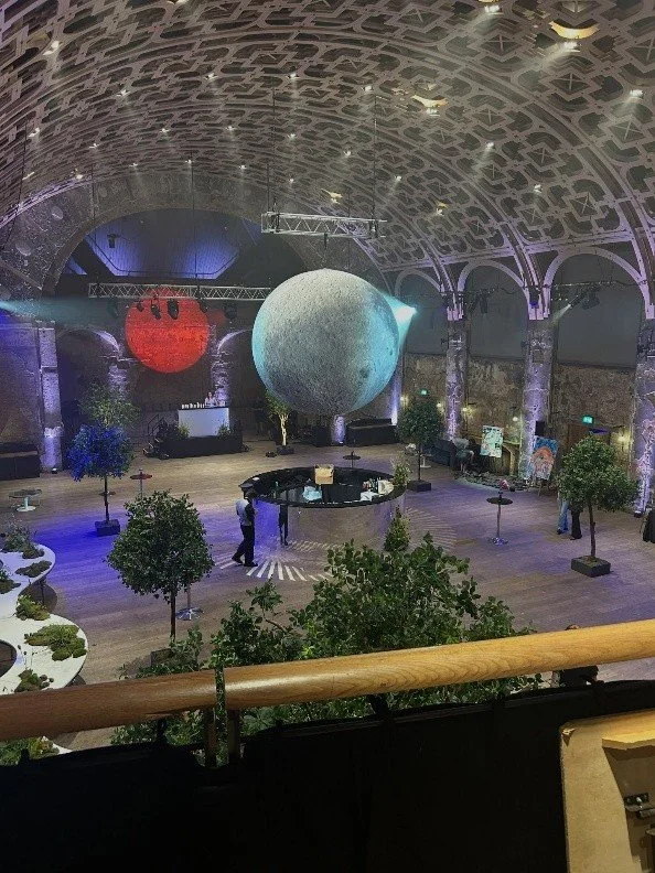 Inflatable Moon suspended Mid-air in Battersea Art Centre.
