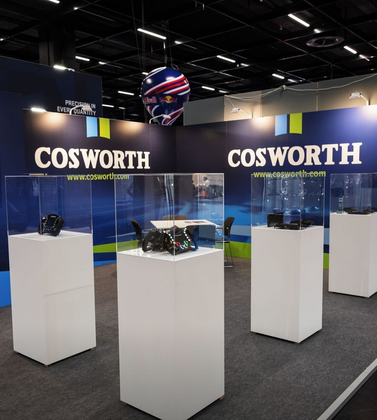 Cosworth exhibition stand with branded displays and automotive technology exhibits