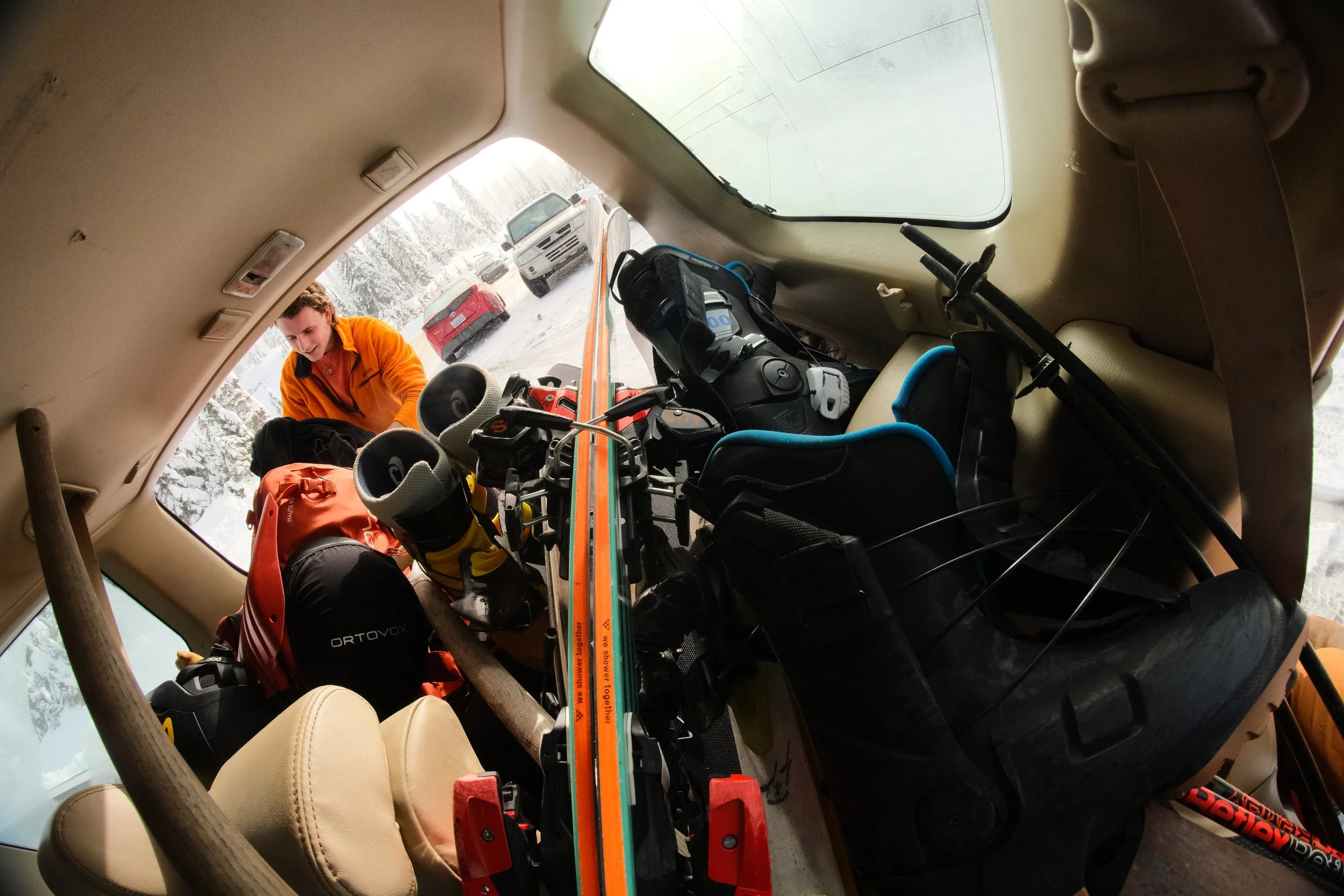 Skier Mosi Slotten removes his gear from the car upon arriving to Mount Baker Ski Area on Tuesday, Nov. 15, 2025, in Deming, Wash. Slotten is excited as early snow gave him the opportunity to get on his skis for the first time of the ski season, earl