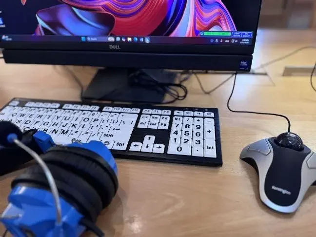 Laptop for hearing/visually impaired