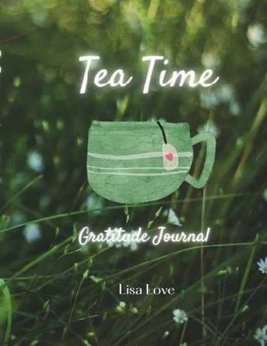Book cover titled 'Tea Time' with a green teacup illustration and the subtitle 'Gratitude Journal' by Lisa Love, set against a background of grass and white flowers.