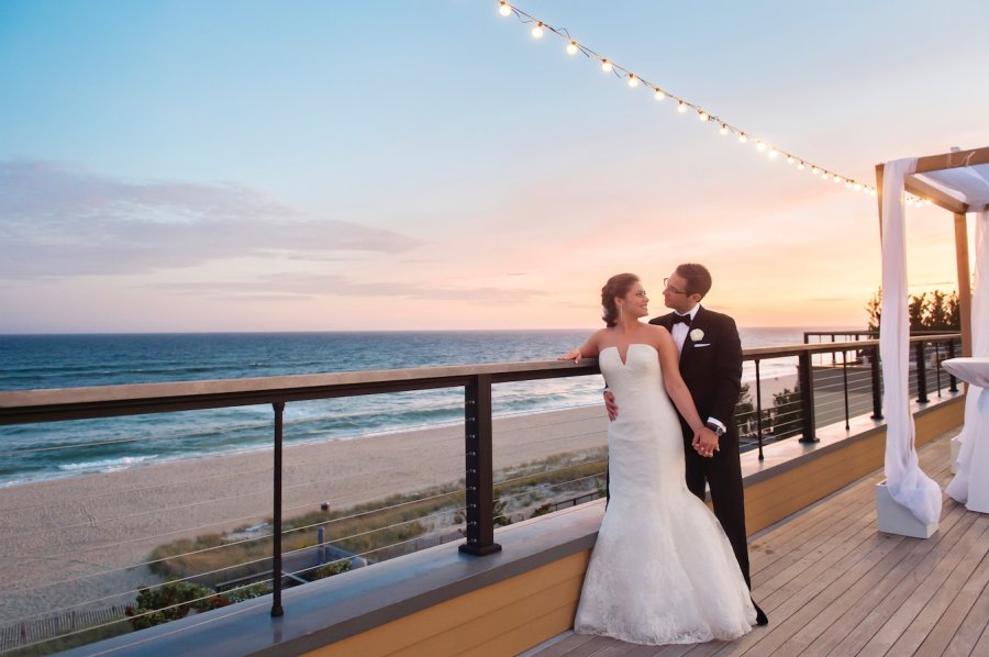 bride and groom on deck of a Hamptons wedding venue
