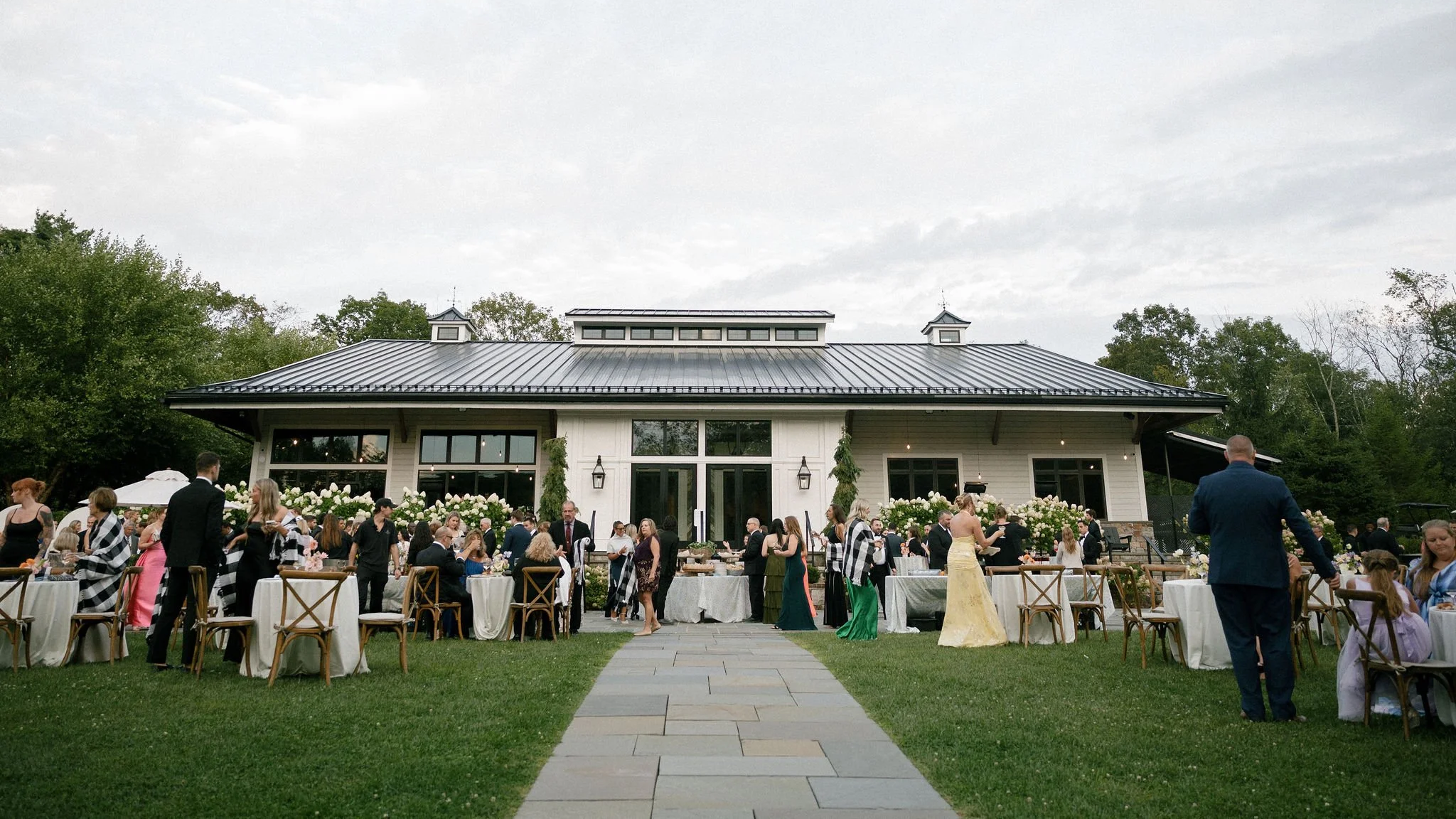 Guests at Cocktail Hour at a Wedding Planned by Faith Ferguson Productions