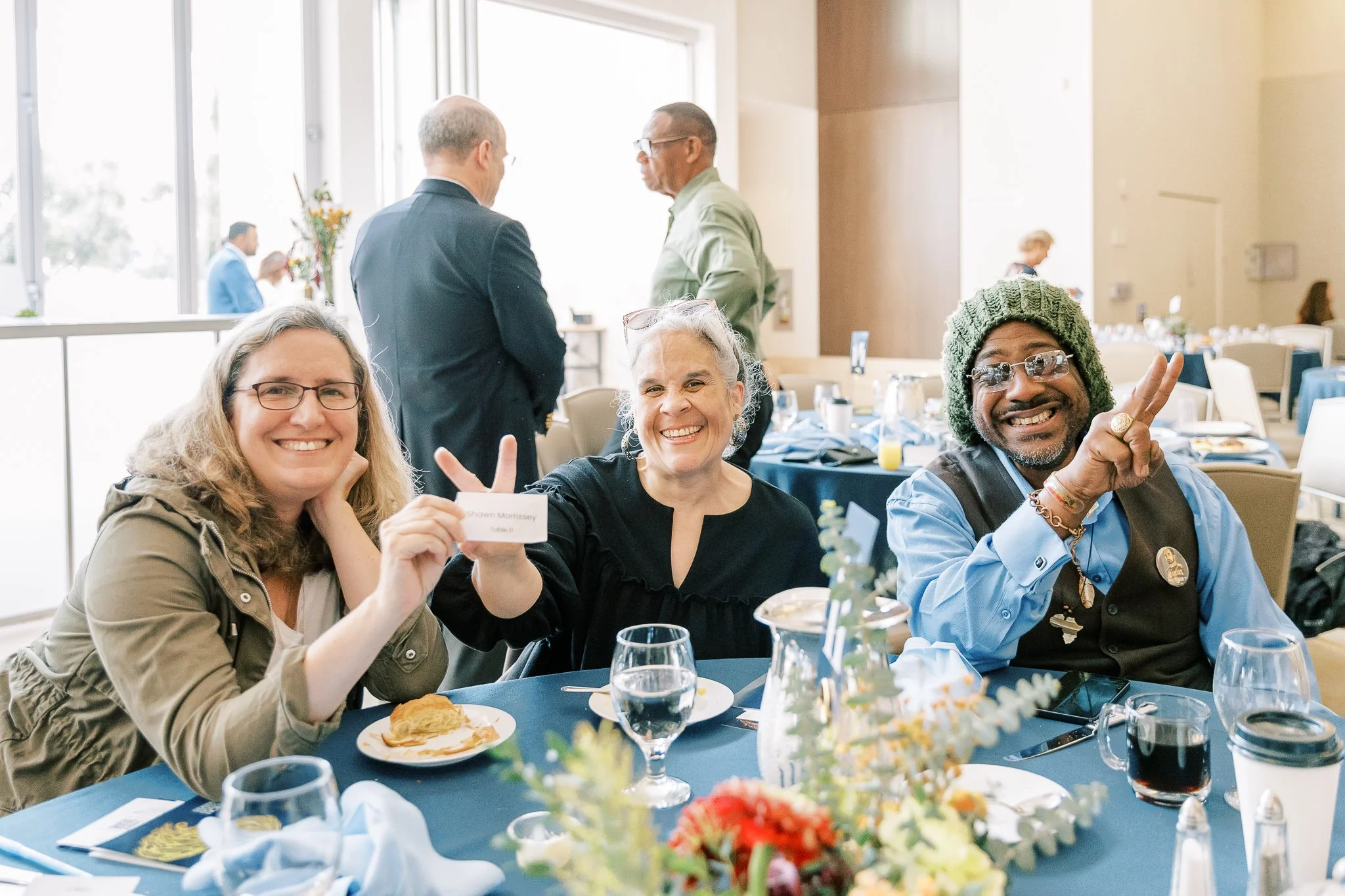 LEAP Members enjoy pastries at USHS Brunch for the Station