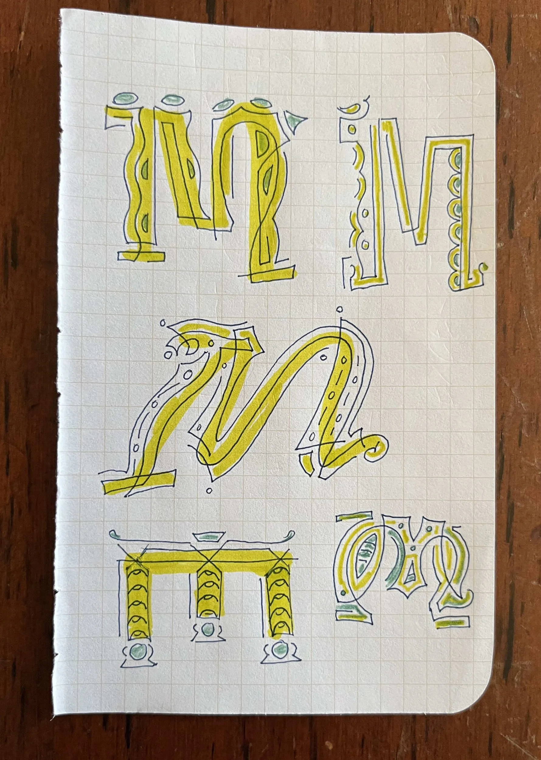 Multiple letters of M in yellow with green accents