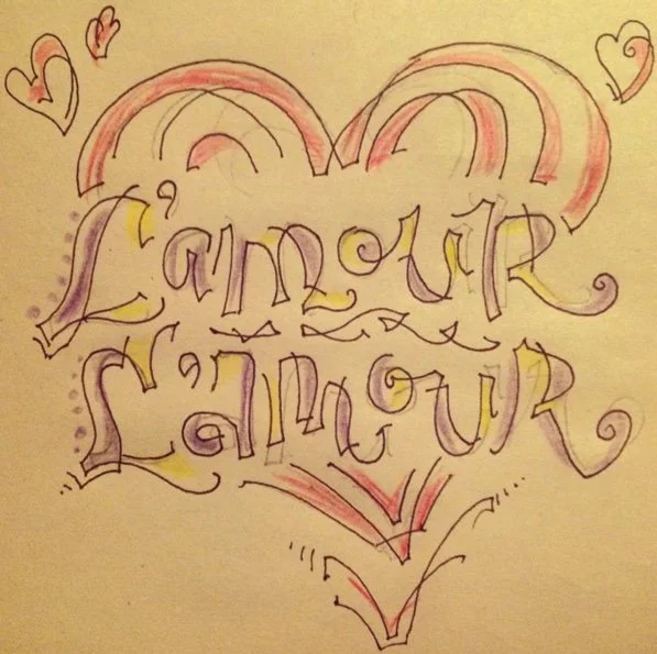 Colorful hand-drawn artwork featuring the phrase "L'amour L'amour" with decorative hearts and swirls.