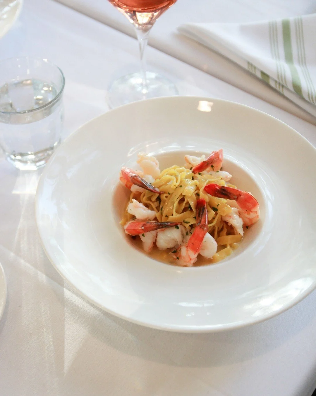 A refreshing plate of pasta - our classic Shrimp Scampi. Hope to see you soon for dinner!