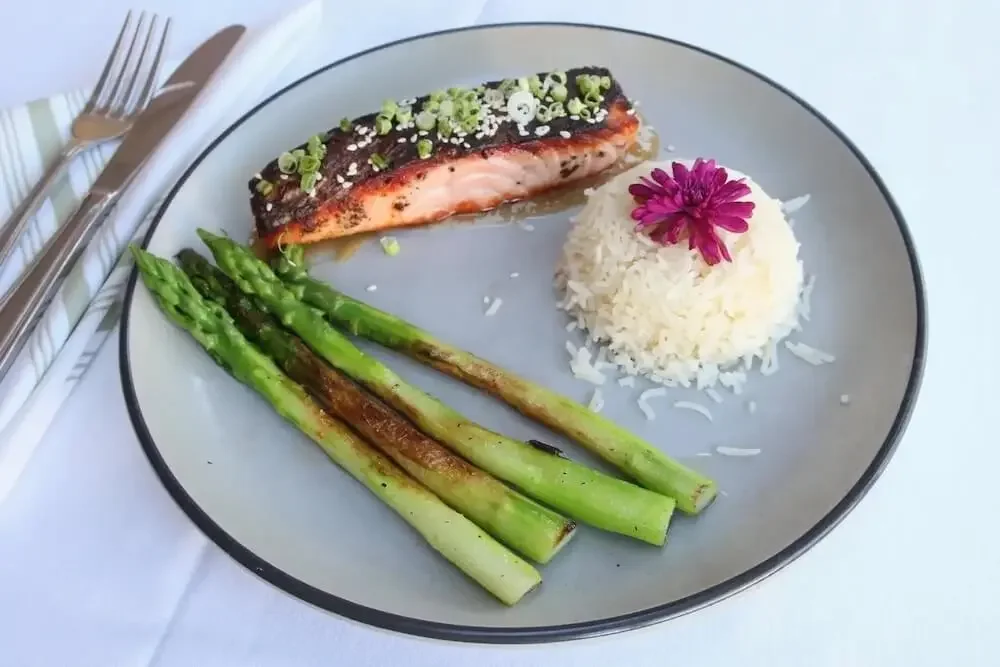 Grilled salmon with asparagus and rice at Lilac, a family-owned Montecito restaurant on Coast Village Road.